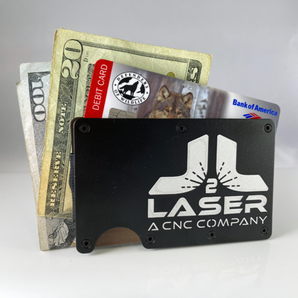 Black engraved metal wallet with money and debit card