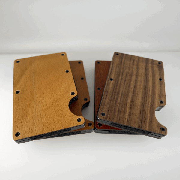 Flatlay four wood engravable wallets